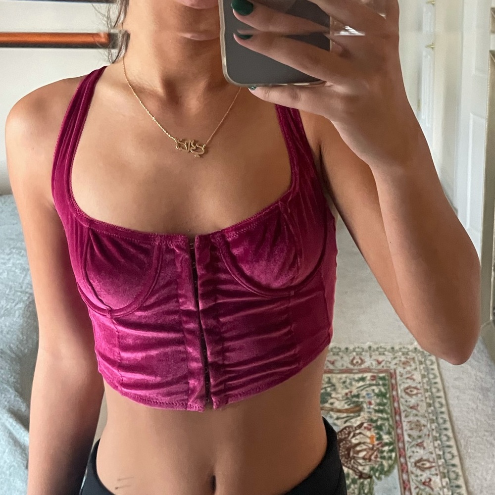 Out from under urban outfitters bustier dark pink front and back buckles